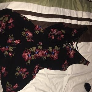 Black, floral romper by Kendall and Kylie